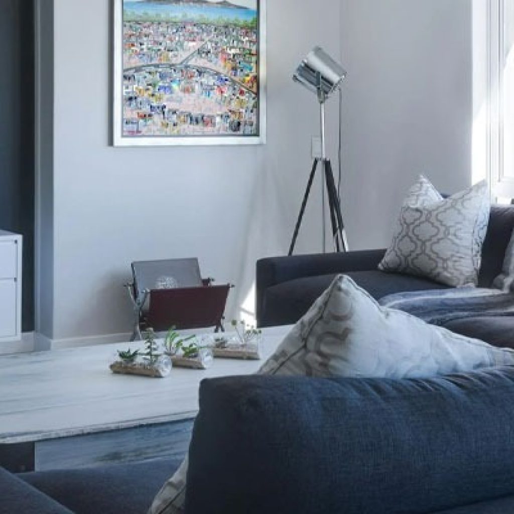 How can tourists make significant savings by renting short-term rental apartments?