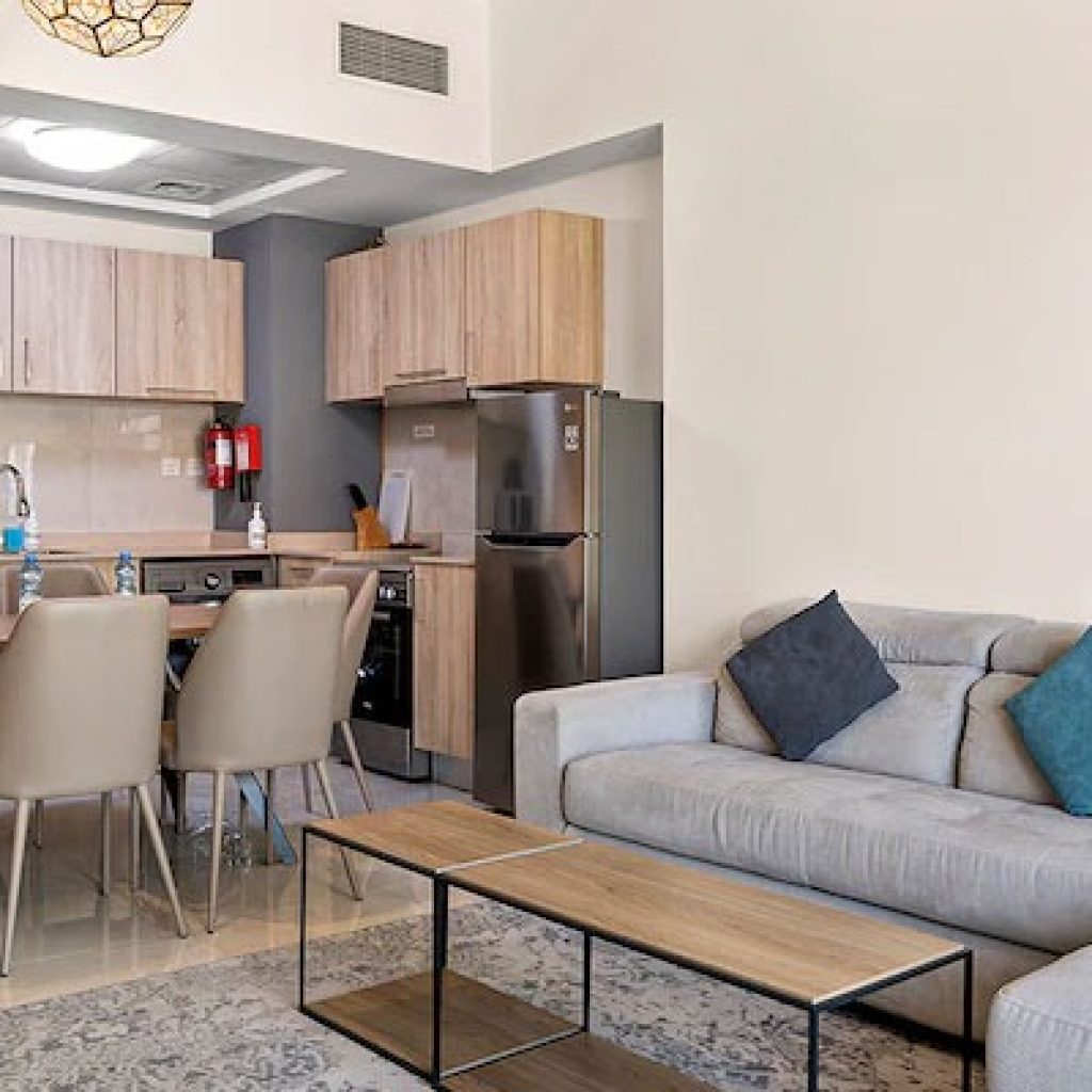 Why do business travelers prefer a furnished room for rent in Dubai for one month