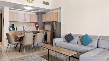 Why do business travelers prefer a furnished room for rent in Dubai for one month
